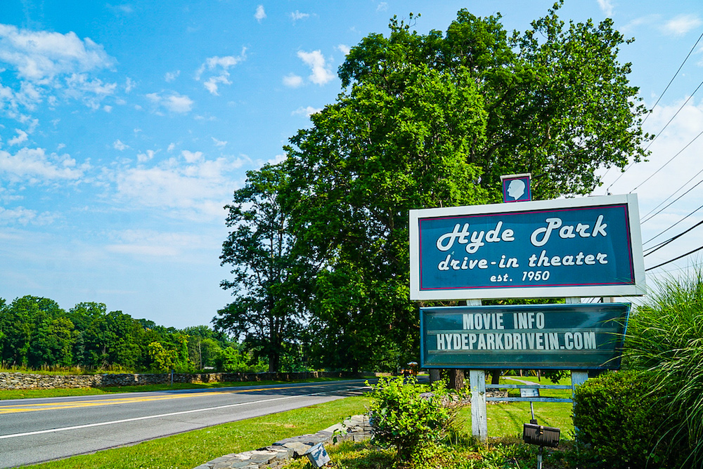 The sign in front of the Hyde Park Drive with a road passing through is one of the cool places to visit and things to do in Poughkeepsie NY