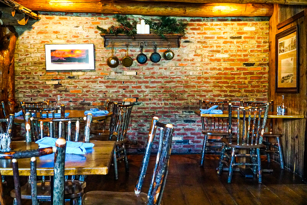 Rustic, Adirondack-style interior of the Log Jam restaurant in Lake George. 