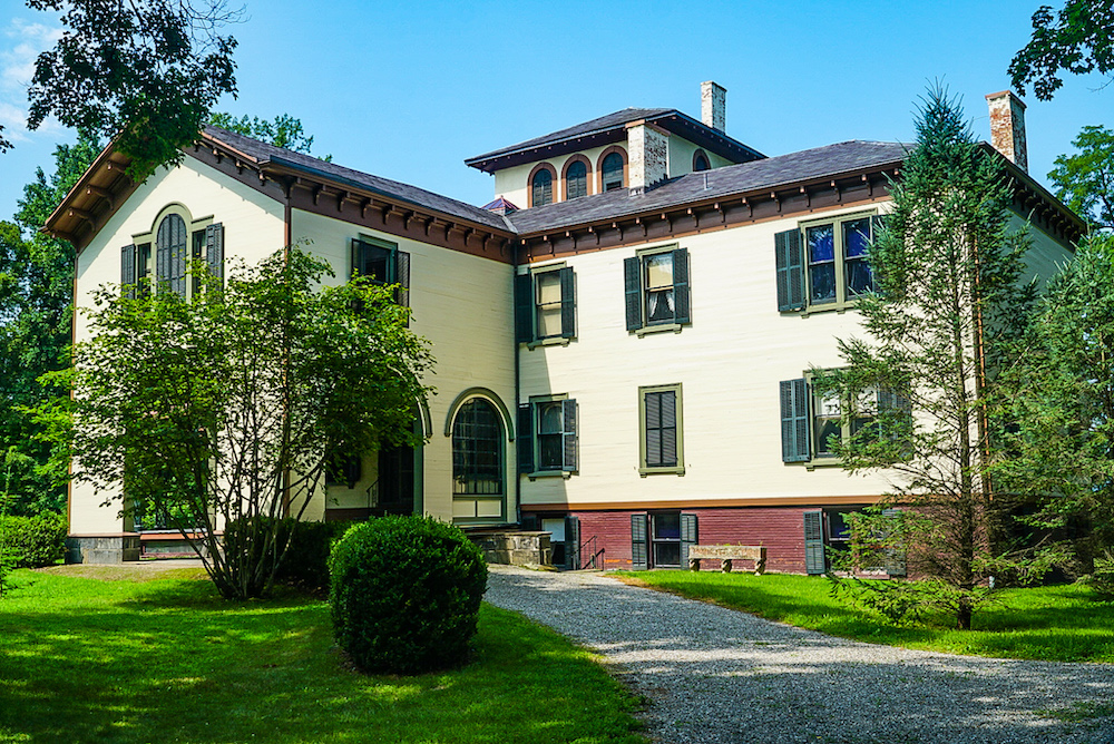 The historic mansion on Locust Grove with its white façade and green windows. It is one of the cool things to do in Poughkeepsie NY if you love history.