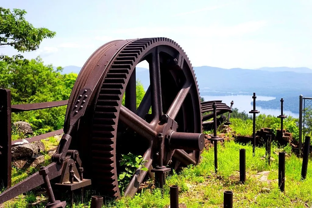 An old railway gear at the summit of Prospect Mountain with Lake George in the background which is one of the cool sites in the area.