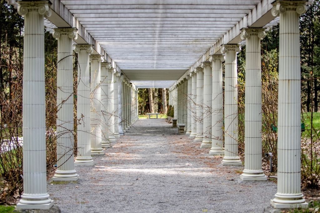 A tunnel of roman columns in Yaddo Rose Garden in Saratoga, NY