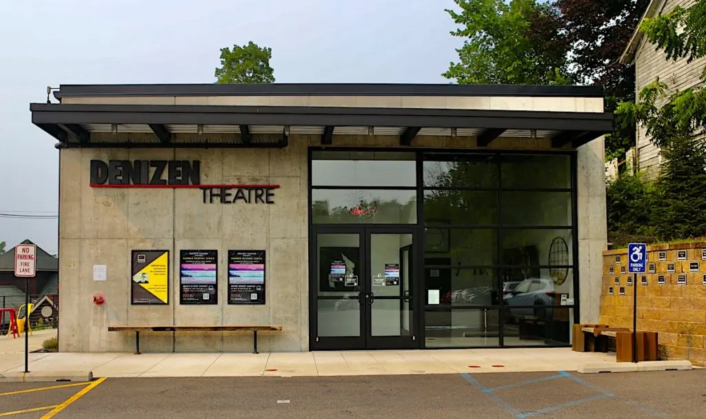 Concrete exterior of the Denizen Theatre, one of the best things to do in New Paltz, NY. 