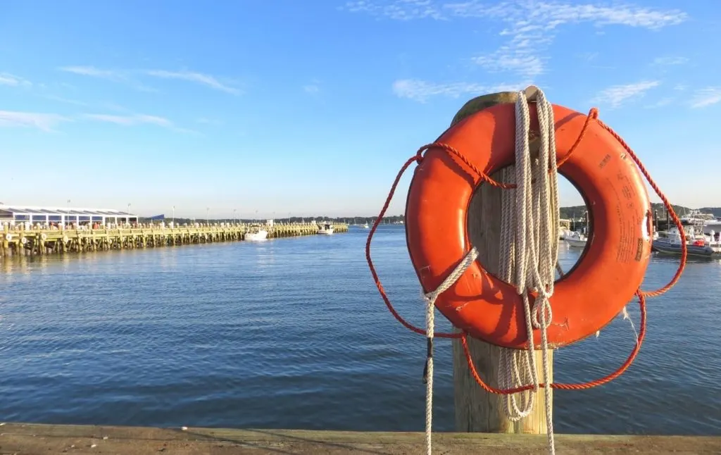 Orange lifesaver at Greenport Harbor in Long Island New York