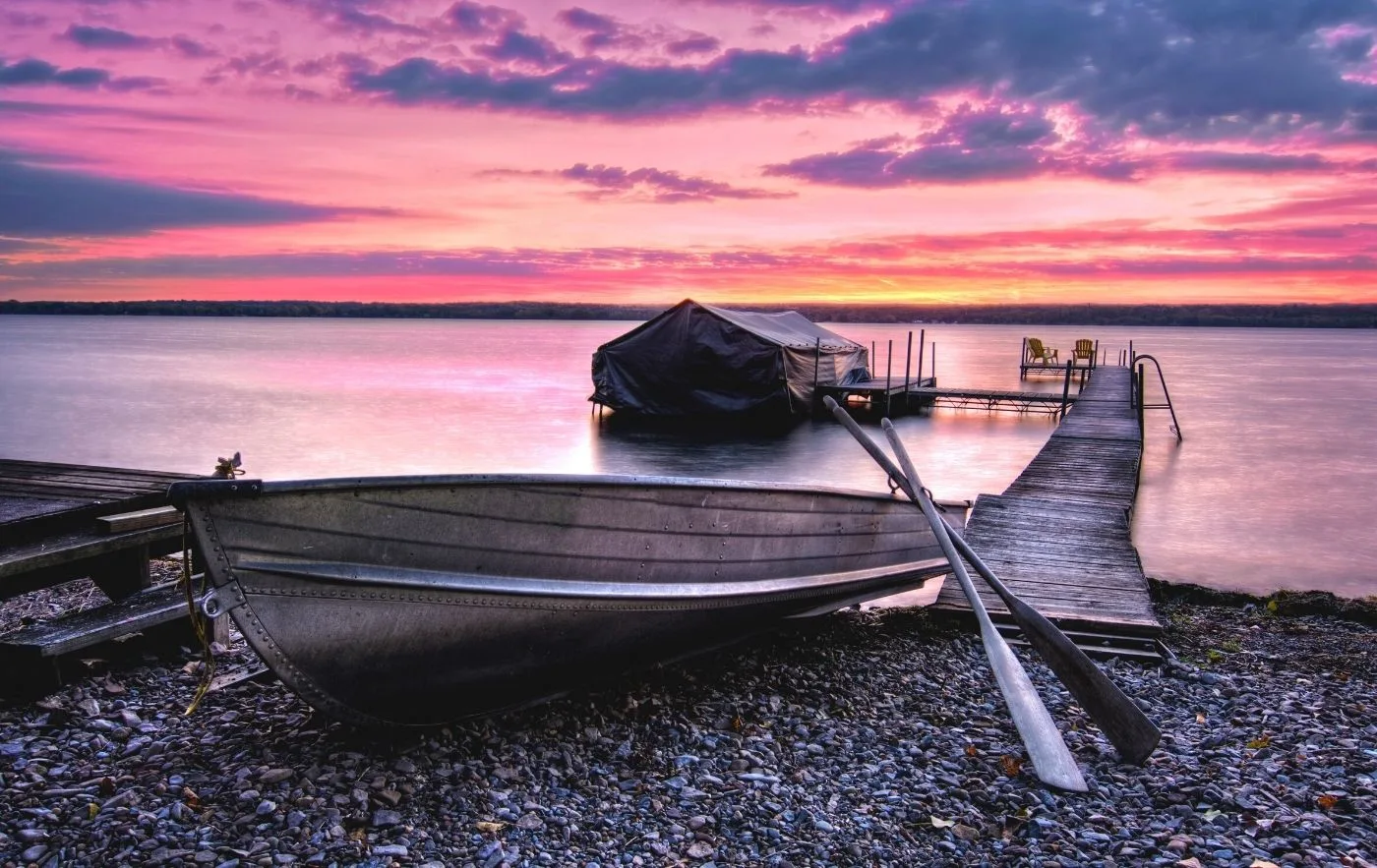 View of Cayuga Lake at sunset, one of the best lakes in New York.