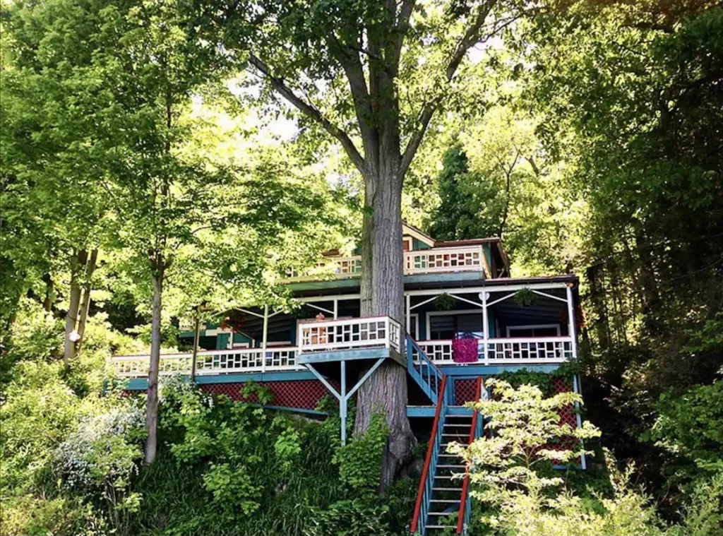 Vibrant exterior of a lakefront treehouse near Ithaca, NY. 