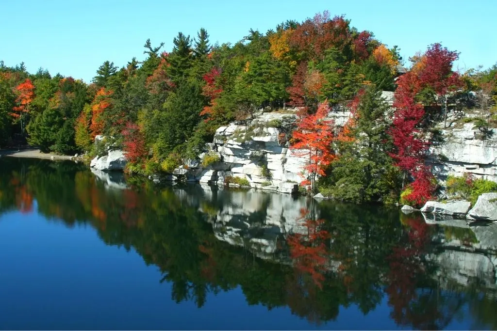 Stunning fall foliage along a lake Minnewaska State Park near New Paltz. 