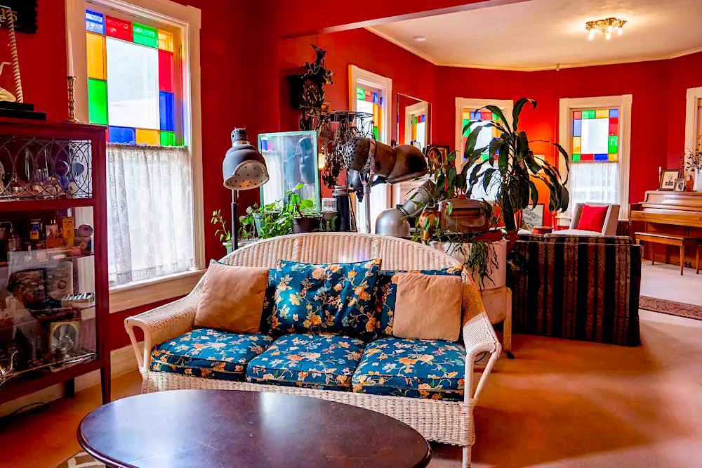 The vibrant red interior and stained glass windows of the River Run Bed and Breakfast, which is near some of the best skiing in New York. 