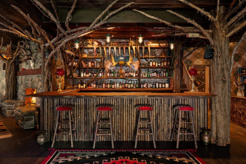 Chic, Adirondack-style bar of Urban Cowboy Lodge. One of the best winter weekend getaways from NYC.