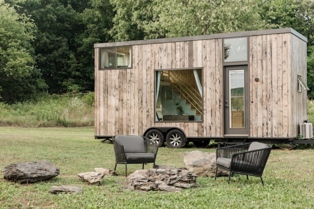 Light-filled wooden tiny house with orchard views and a fire pit near Marlboro. NY. 