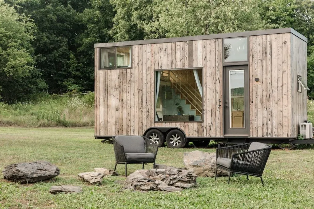 Light-filled wooden tiny house with orchard views and a fire pit near Marlboro. NY. 