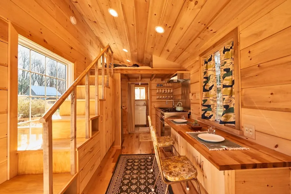 Modern wooden interior of the Outlier Inn Tiny House in New York on a Farm in the Upstate Catskills.
