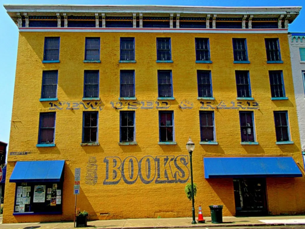 The vibrant yellow exterior of Riverow Bookshop, one of the best things to do in Owego New York. 