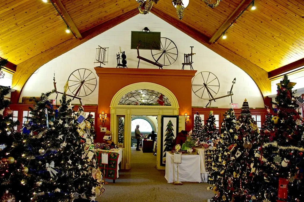 Interior of the Tioga Downs Historical Society which is outfitted with Christmas decor. 