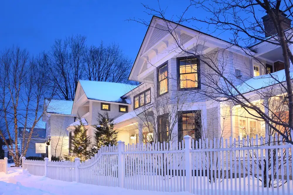 Springwater Bed and Breakfast at night covered in snow in Saratoga Springs. One of the best romantic getaways in upstate New York. 