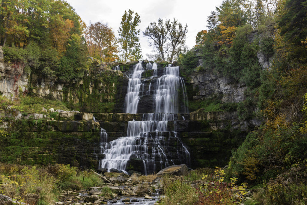 Autumn at the waterfall at Chittenango Falls State Park. One of the best waterfalls near Syracuse, NY. 