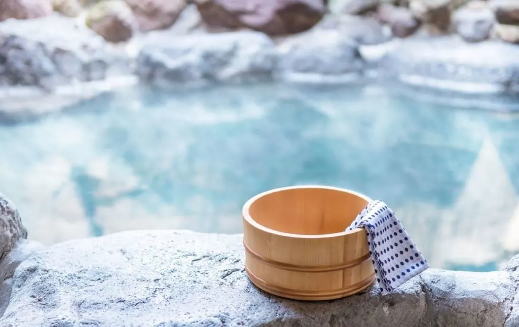 Wooden bucket with a towel in it in a hot spring in New York