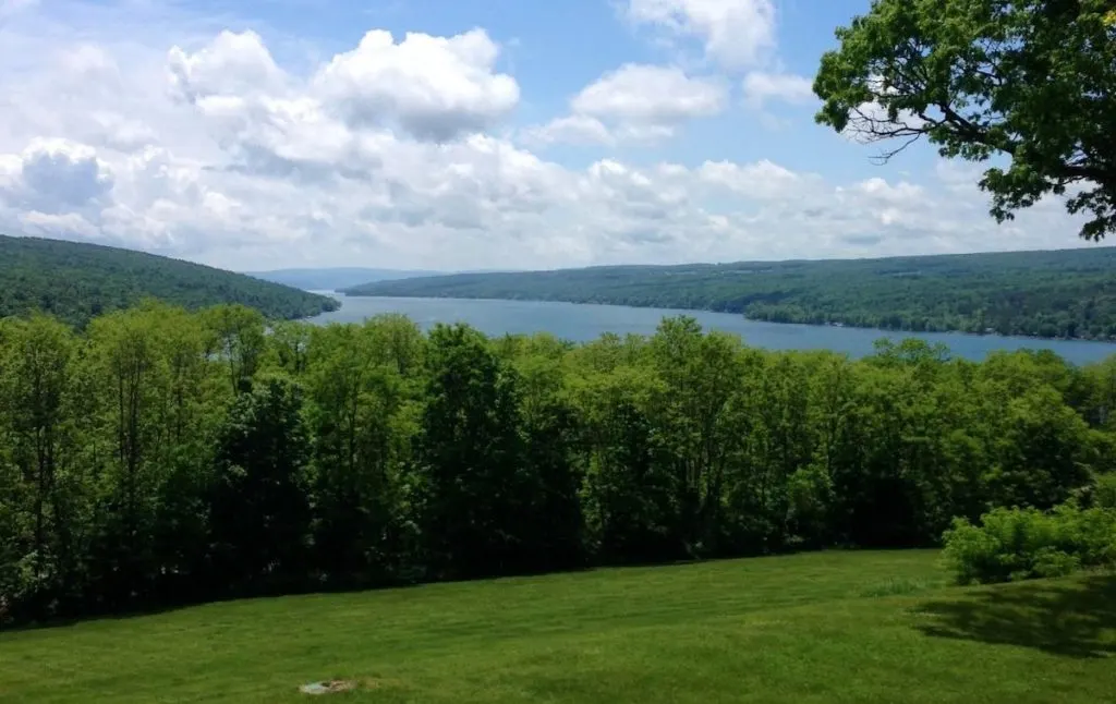 View of Keuka Lake on a spring day from a finger lakes trail. It is views like this that make the hikes in Finger Lakes so popular. 