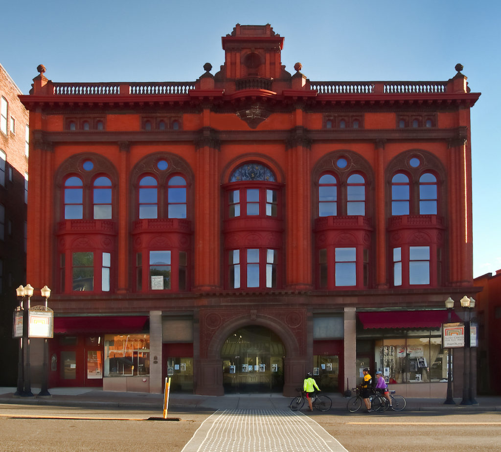 Red exterior of Smith Opera House in Geneva NY, one of the best things to do in Geneva NY. 