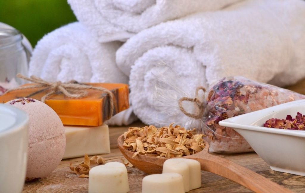 Spa and bath essentials including bath towels, soaps, bath salts and a bath bomb that you can use at one of the best hot springs in new York state. 