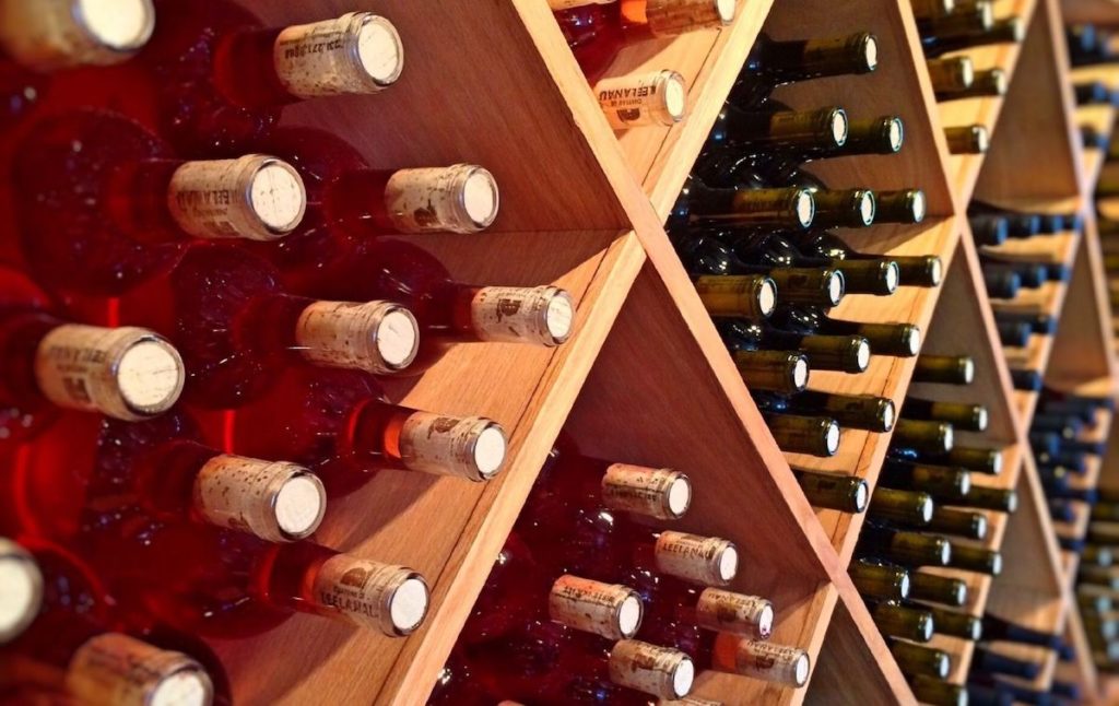 Wine cellar with bottles at one of the best wineries in the Finger Lakes.