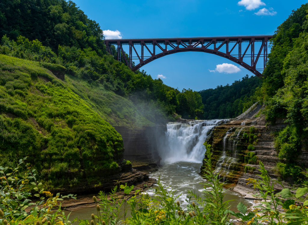 View of the best New York waterfalls which is the Upper Falls on the Genesee River in Letchworth State Park. 