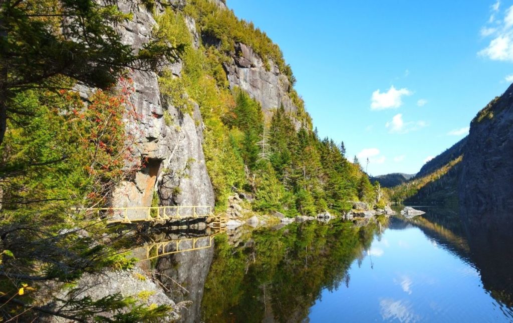 Sheer cliffs and pristine water of Avalanche Lake in the High Peaks region of the Adirondacks. One of the top lakes in New York state. 