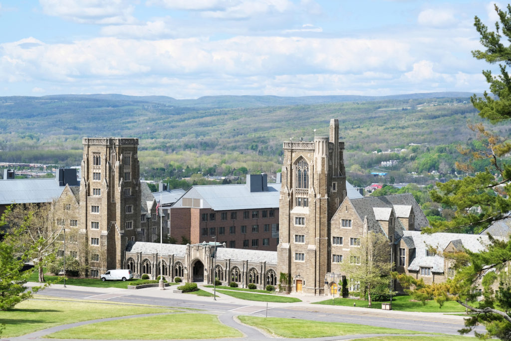 Aerial view of Cornell University with the countryside in the background and one of the best things to do in Ithaca NY.  