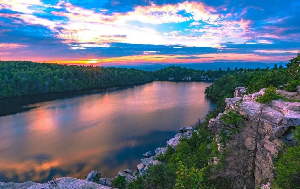 The sun setting over Lake Minnewaka in Minnewaska State Park Preserve. 