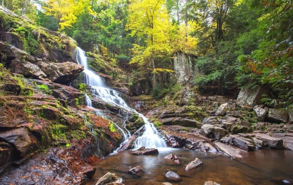 Shelving Rock Falls in Lake George with its rather dramatic rock face has one of the best swimming holes in NY. 