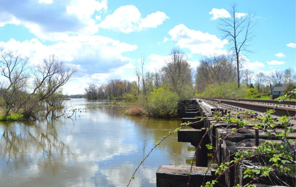 View of the tracks of the Adirondack Scenic Railroad, the perfect addition to any Lake Placid itinerary. 