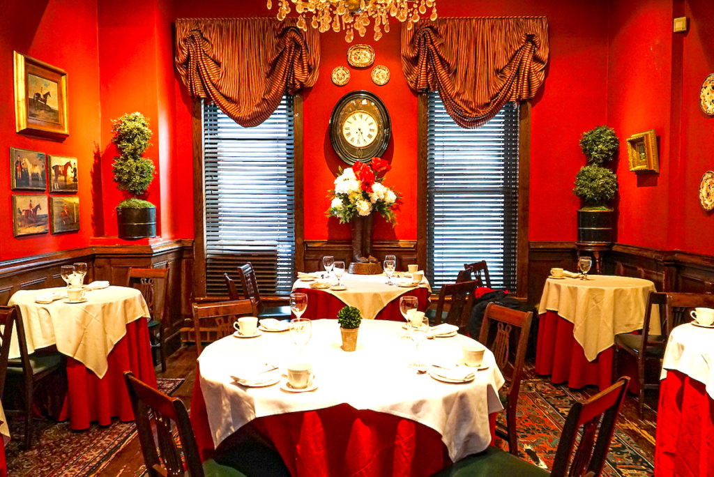 Red interior of King's Carriage House in NYC