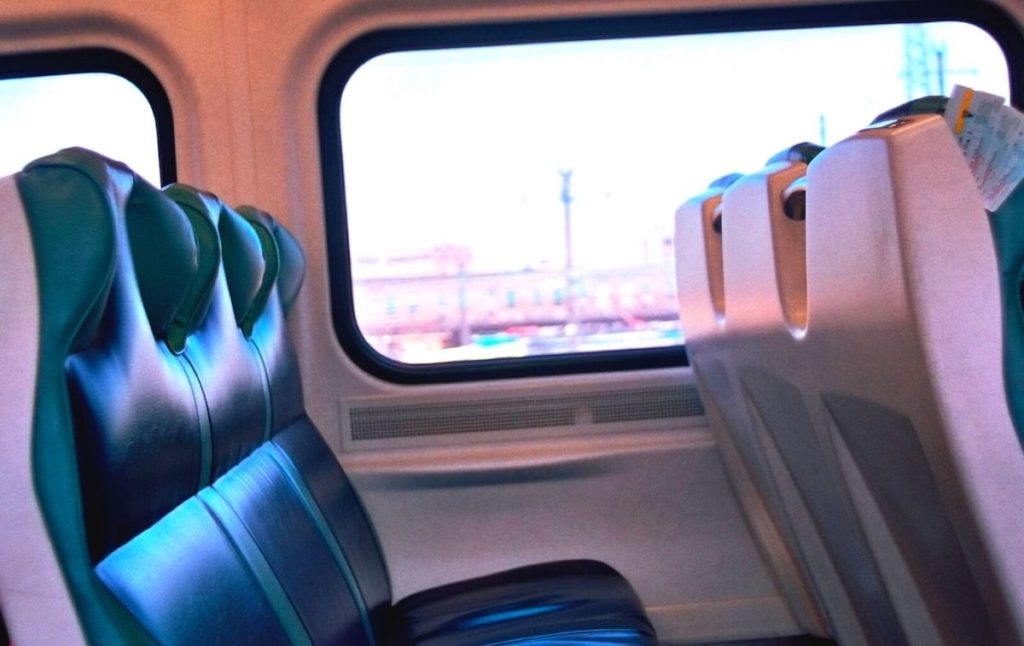 Passenger seats on the Long Island Railroad, one of the best ways to get from NYC to the Hamtpons. 