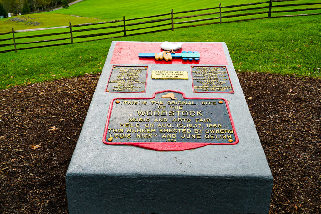 Plaque at the site of the Woodstock Music Festival which is by far the most popular thing to do in Woodstock NY.