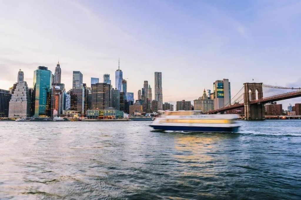 Boat cruising along the Hudson with the Manhattan skyline in the background. Perfect for this Christmas in NYC., 