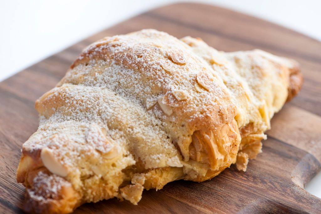 Fresh almond croissant from one of the best coffee shops in Brooklyn. 