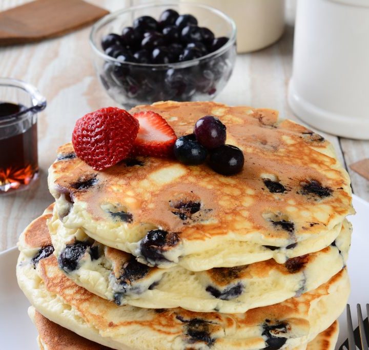 Plate of blueberry pancakes from one of the best diners in Brooklyn.