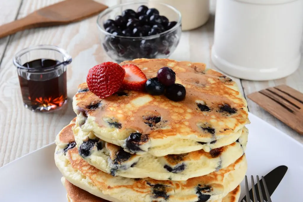 Plate of blueberry pancakes from one of the best diners in Brooklyn. 