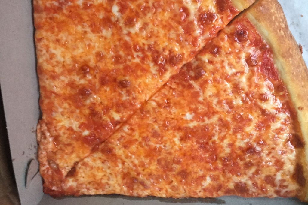 two slices of new york style pizza