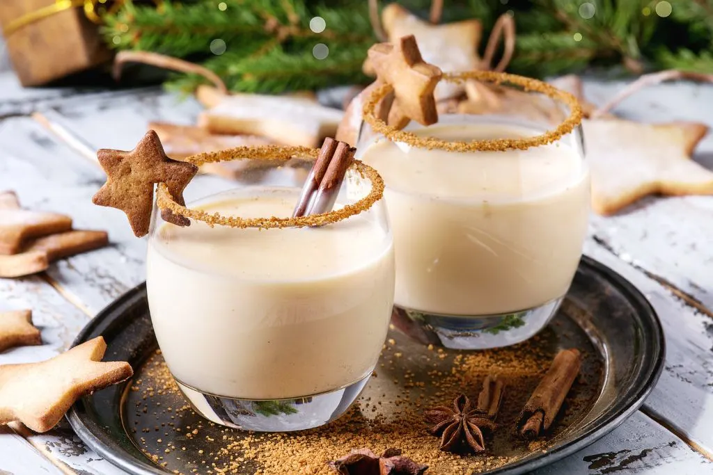 Christmas cocktails with a sugar cookie on the rim. 