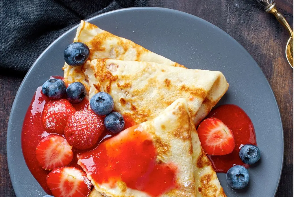 Crepes with sweet strawberries from Poppleton Bakery and Cafe, one of the top things to do in Corning NY. 