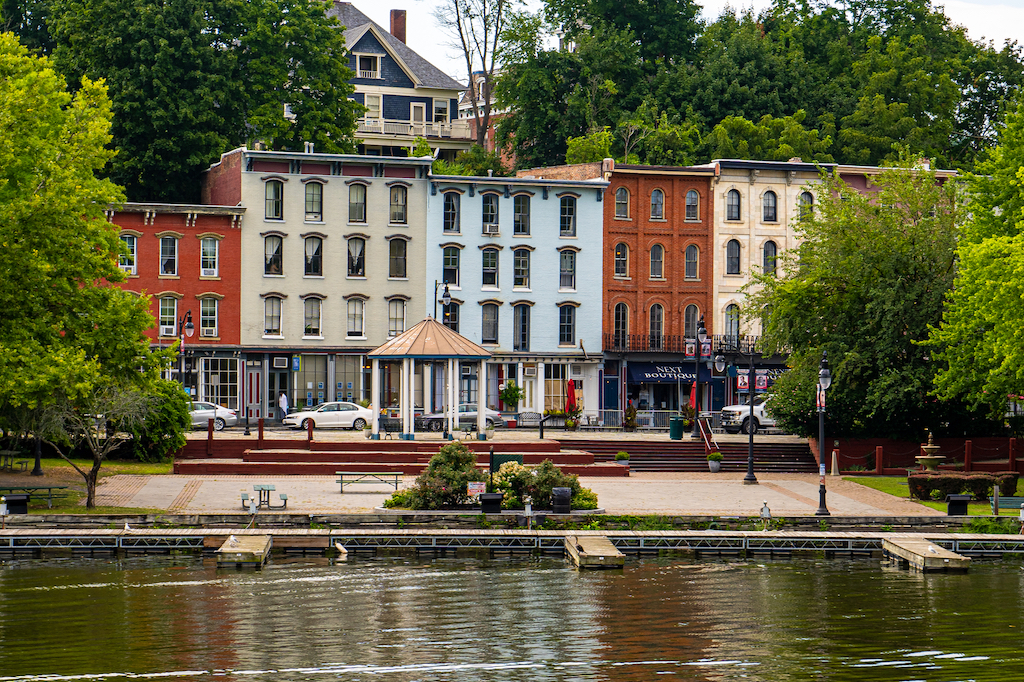 Vibrant and historic buildings in the downtown area of Kingston that overlook the water. 