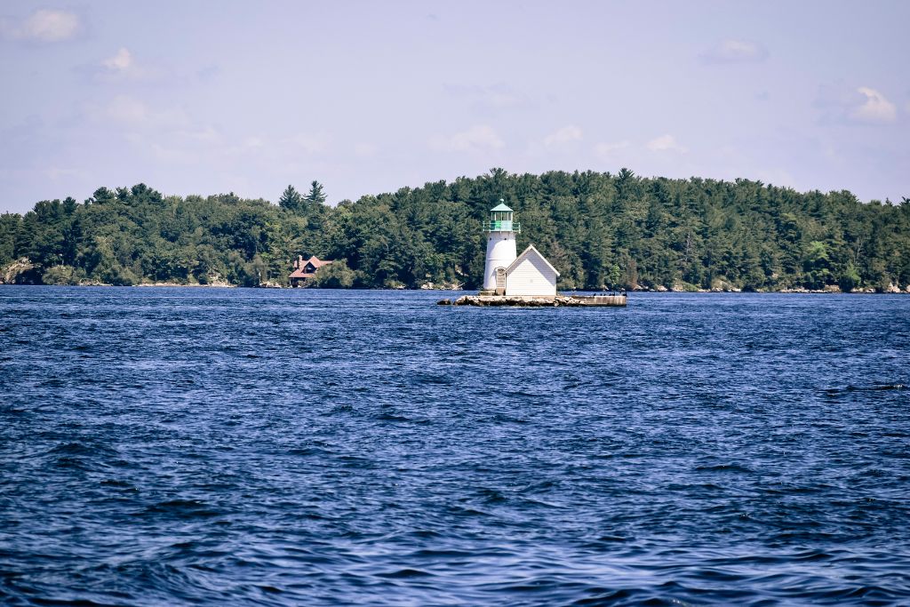 Quaint white lighthouse in the middle of Alexandria BY NY