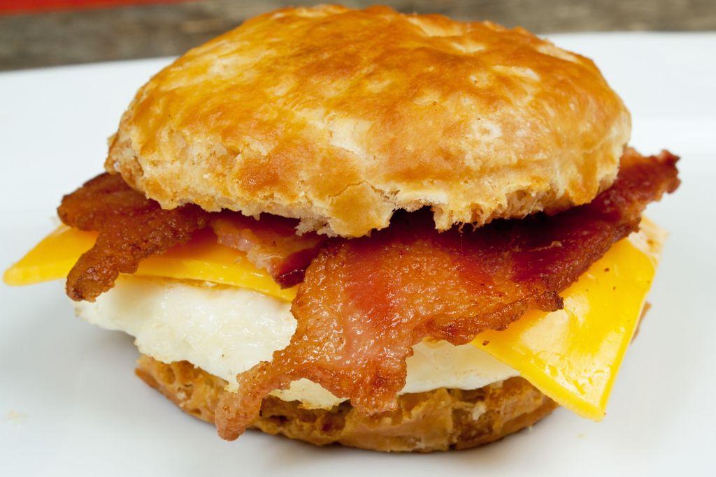 Homemade bacon, egg, and cheese on a biscuit. 