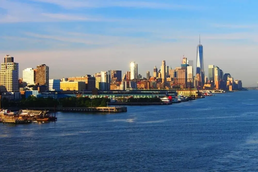 View of Chelsea Piers and the NYC skyline with the world trade center in the background as you enjoy the best things to do in NYC with kids. 