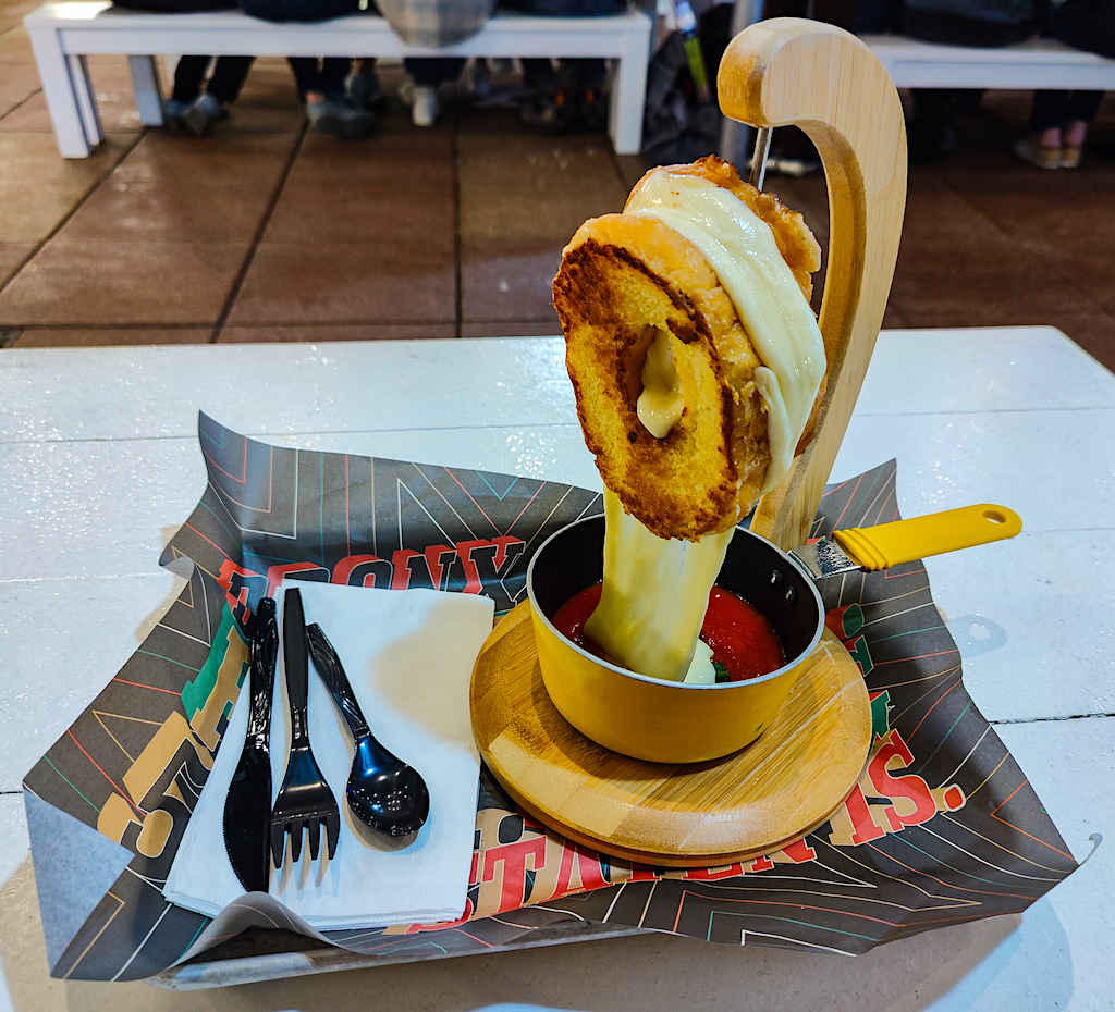 A doughnut grilled cheese from Clinton Hall with Tomato Soup. One of the most unusual things to do in NYC. 