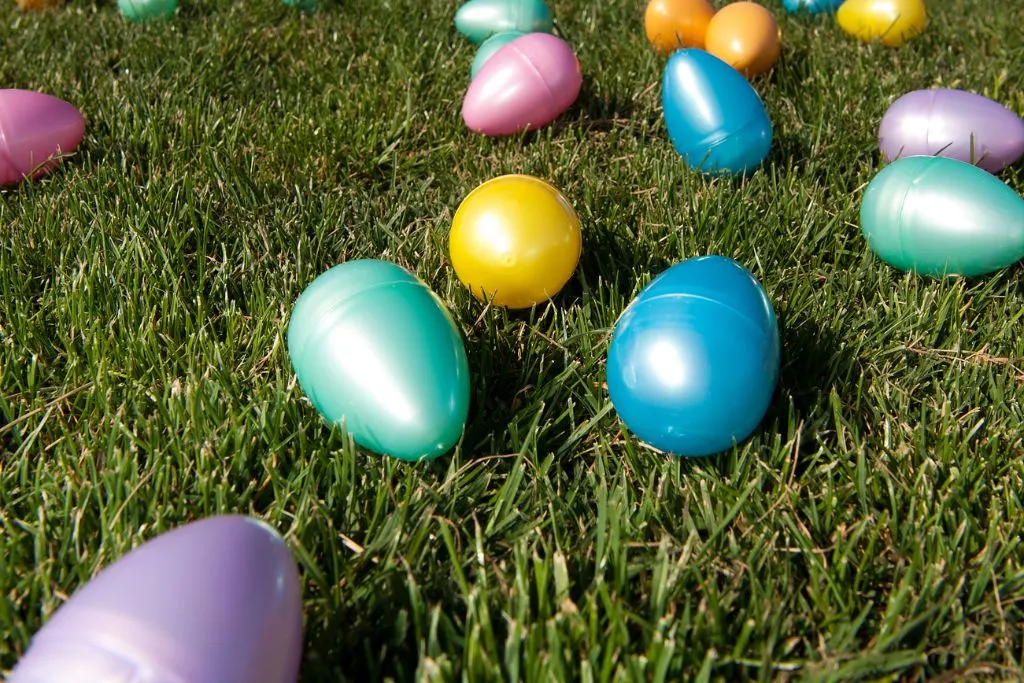 Colorful plastic Easter eggs on the lawn during NYC in April. 