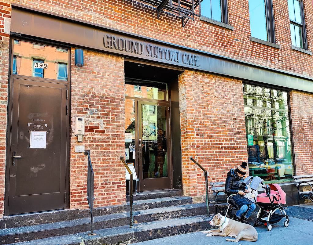 The brick exterior of Ground Support Cafe, one of the best cafes in SOHO NYC. 