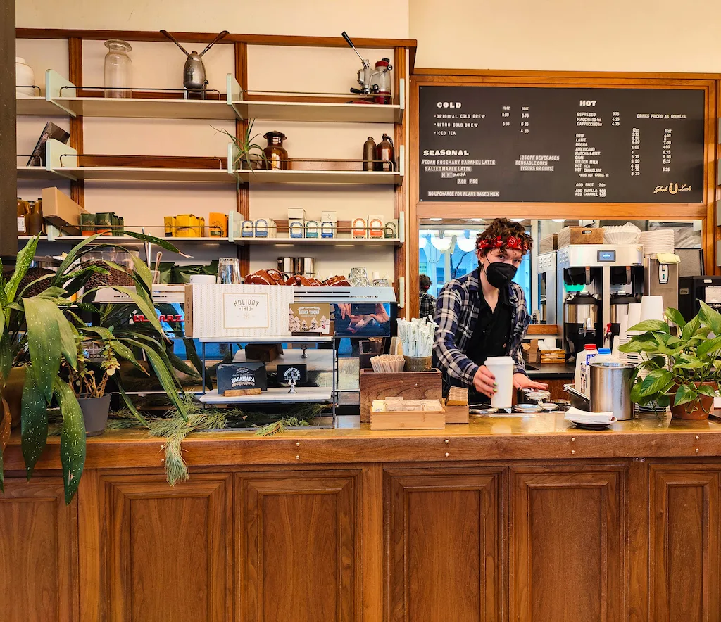 Barista serving up coffee at Stumptown Coffee Roasters. 