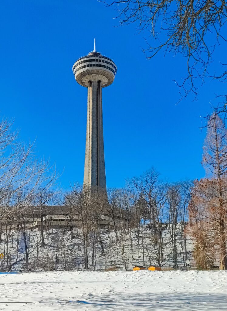 View of the observation tower in Niagara Falls in winter on a sunny day. 