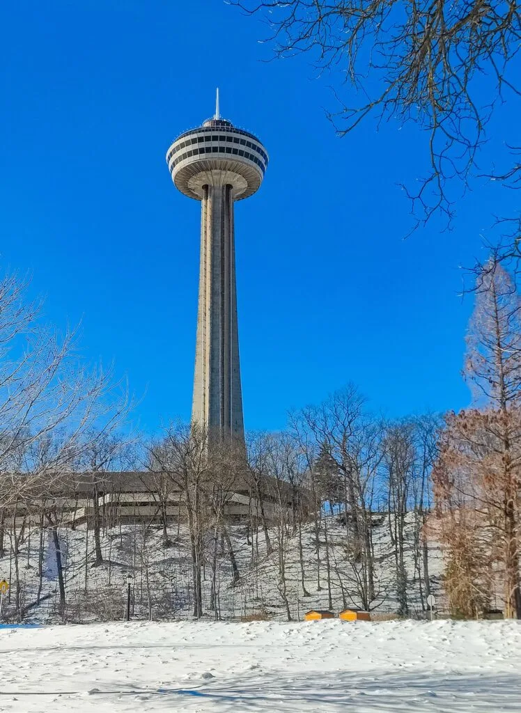 View of the observation tower in Niagara Falls in winter on a sunny day. 
